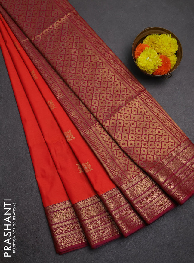 Semi soft silk saree orange and purple with allover zari woven buttas and zari woven border