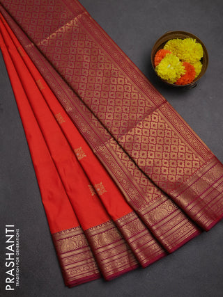 Semi soft silk saree orange and purple with allover zari woven buttas and zari woven border