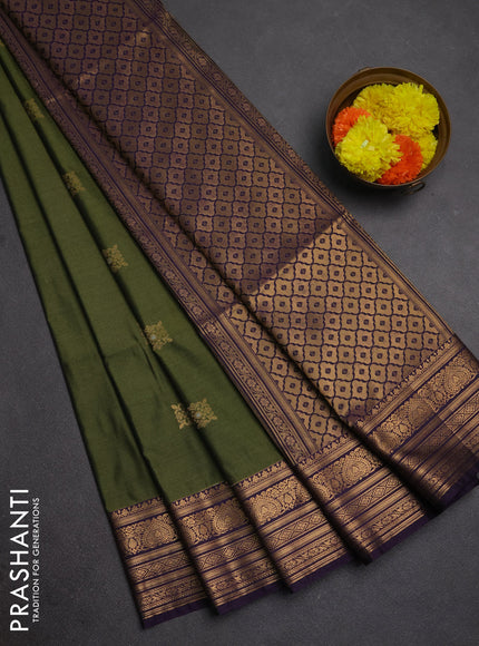 Semi soft silk saree mehendi green and purple with allover zari woven buttas and zari woven border