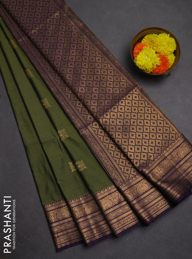 Semi soft silk saree mehendi green and purple with allover zari woven buttas and zari woven border