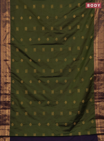 Semi soft silk saree mehendi green and purple with allover zari woven buttas and zari woven border