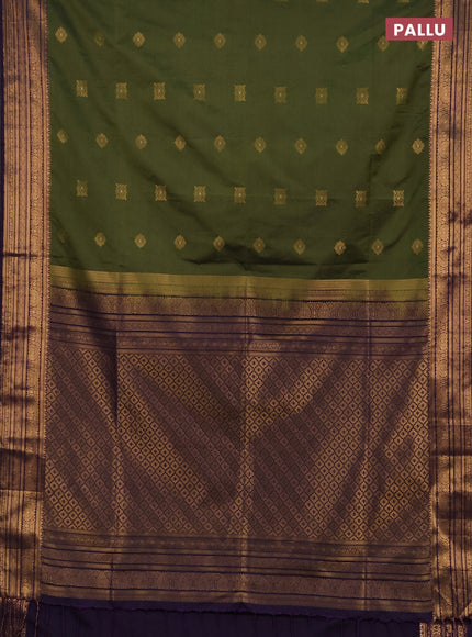 Semi soft silk saree mehendi green and purple with allover zari woven buttas and zari woven border