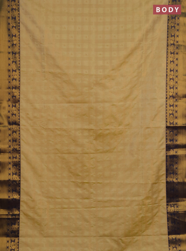 Semi soft silk saree pale yellow and navy blue with allover zari checks & buttas and rich zari woven border