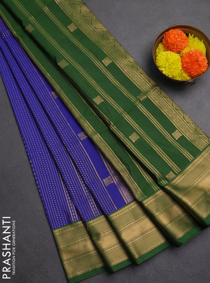 Semi soft silk saree blue and green with allover zari weaves and zari woven border