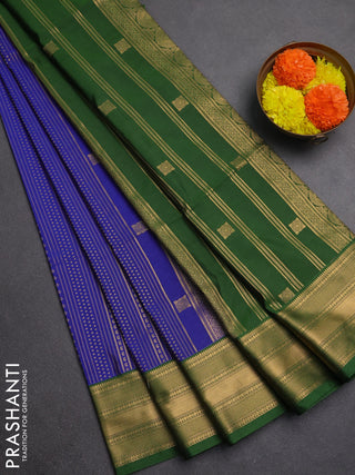 Semi soft silk saree blue and green with allover zari weaves and zari woven border