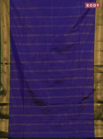 Semi soft silk saree blue and green with allover zari weaves and zari woven border