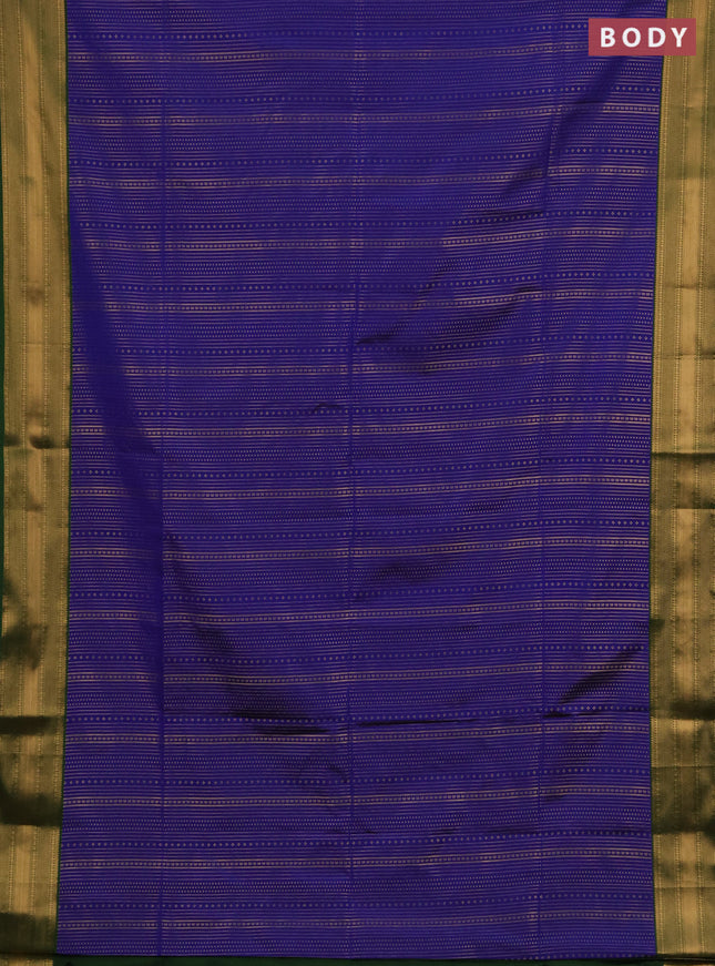 Semi soft silk saree blue and green with allover zari weaves and zari woven border
