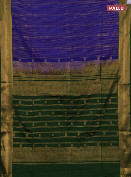 Semi soft silk saree blue and green with allover zari weaves and zari woven border