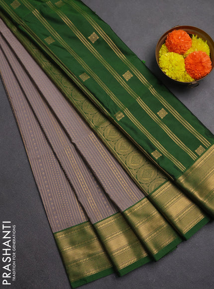 Semi soft silk saree grey and green with allover zari weaves and zari woven border