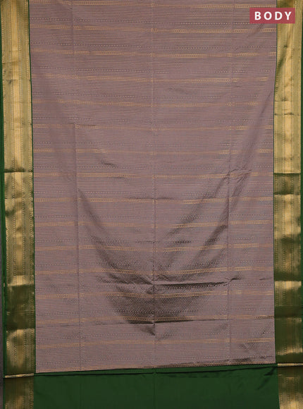 Semi soft silk saree grey and green with allover zari weaves and zari woven border