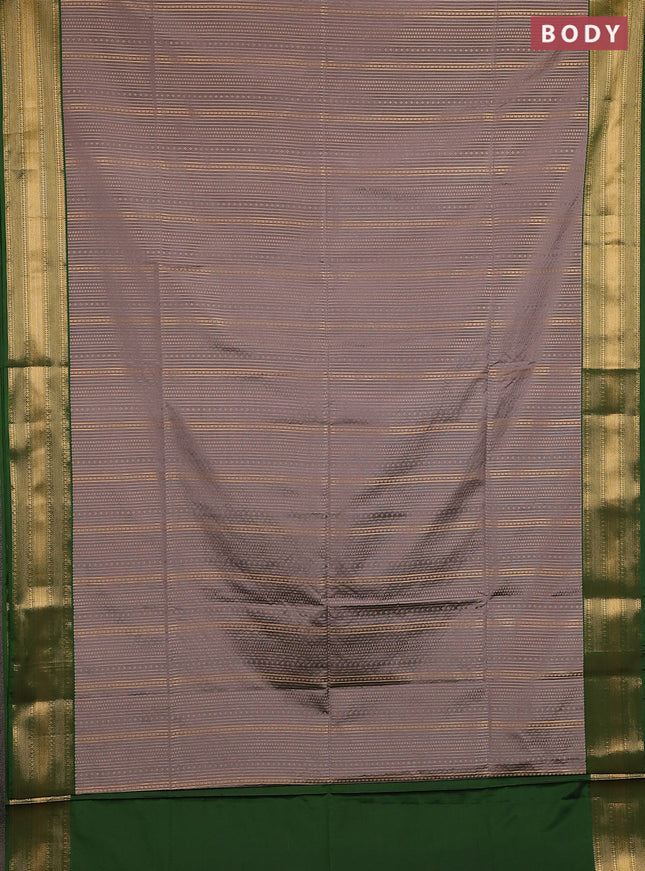Semi soft silk saree grey and green with allover zari weaves and zari woven border