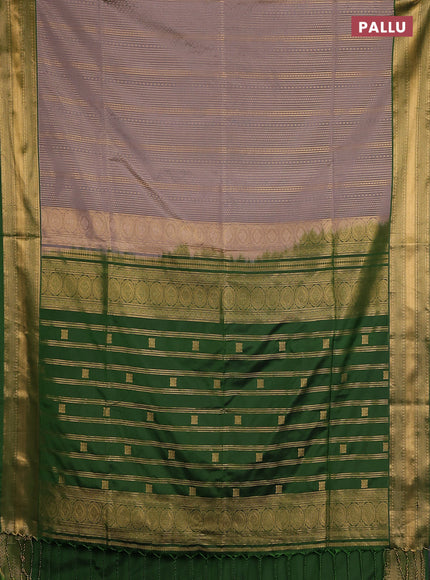 Semi soft silk saree grey and green with allover zari weaves and zari woven border