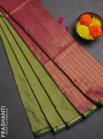 Semi soft silk saree green and magenta pink with allover silver & gold zari woven buttas and zari woven piping border