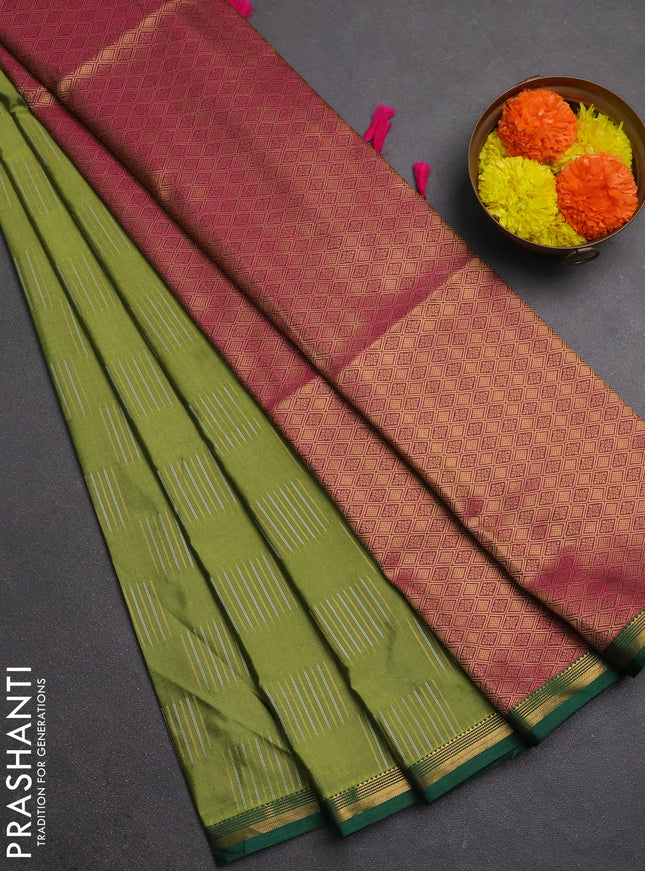 Semi soft silk saree green and magenta pink with allover silver & gold zari woven buttas and zari woven piping border