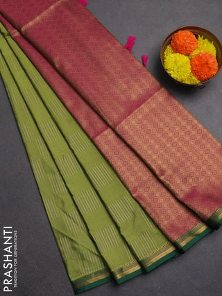 Semi soft silk saree green and magenta pink with allover silver & gold zari woven buttas and zari woven piping border