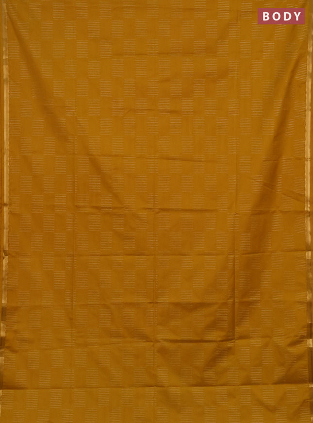 Semi soft silk saree mustad yellow and green with allover silver & gold zari woven buttas and zari woven piping border
