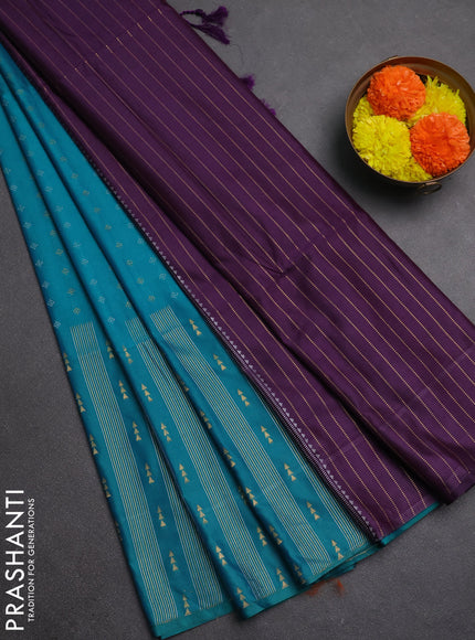 Semi soft silk saree teal green and purple with allover silver & gold zari woven buttas
