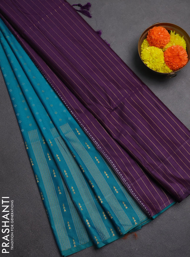 Semi soft silk saree teal green and purple with allover silver & gold zari woven buttas