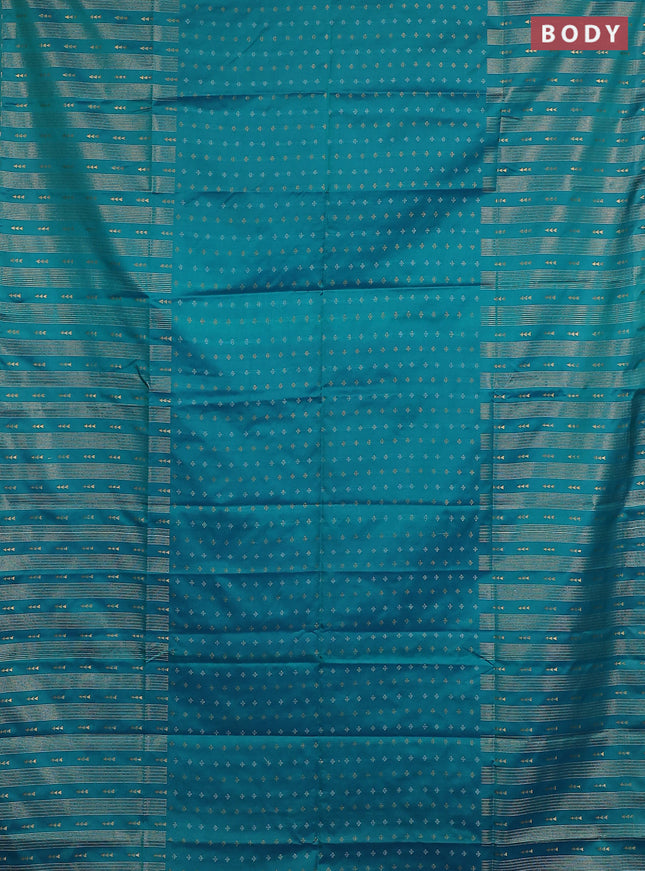Semi soft silk saree teal green and purple with allover silver & gold zari woven buttas