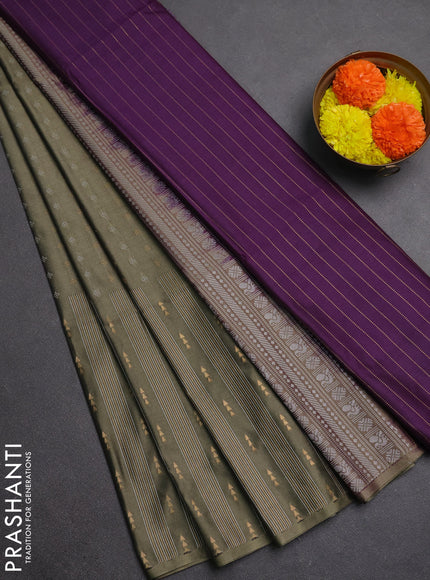 Semi soft silk saree olive green and deep purple with allover silver & gold zari woven buttas and long zari woven border