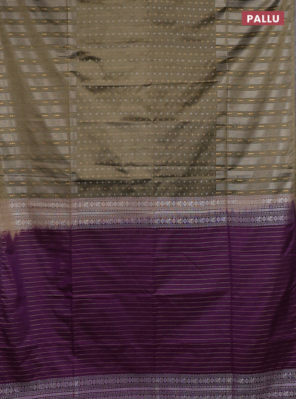 Semi soft silk saree olive green and deep purple with allover silver & gold zari woven buttas and long zari woven border
