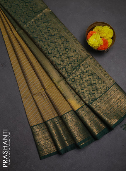Semi soft silk saree mustard yellow and bottle green with allover zari weaves and zari woven border