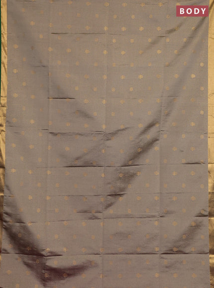 Semi soft silk saree grey shade and green magenta pink with allover zari checks & buttas and rich zari woven border