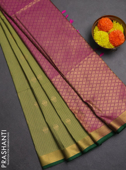 Semi soft silk saree green and green magenta pink with allover zari checks & buttas and rich zari woven border