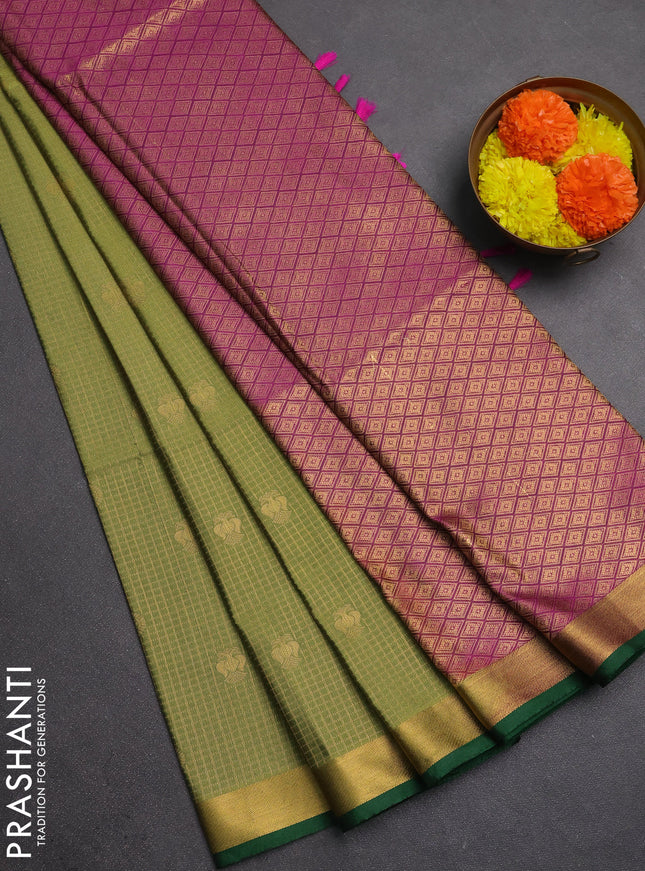 Semi soft silk saree green and green magenta pink with allover zari checks & buttas and rich zari woven border