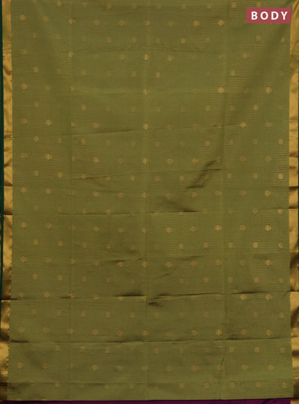 Semi soft silk saree green and green magenta pink with allover zari checks & buttas and rich zari woven border
