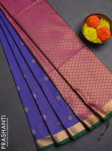 Semi soft silk saree blue and green with allover zari checks & buttas and rich zari woven border