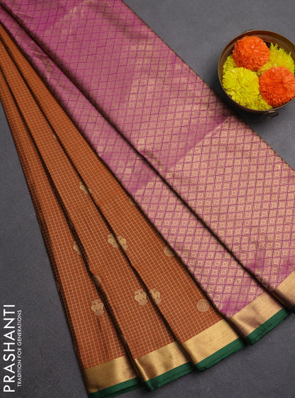 Semi soft silk saree rust shade and green with allover zari checks & buttas and rich zari woven border