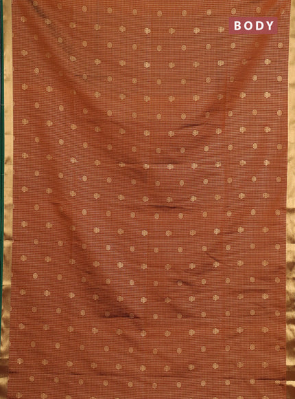 Semi soft silk saree rust shade and green with allover zari checks & buttas and rich zari woven border