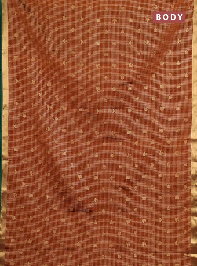 Semi soft silk saree rust shade and green with allover zari checks & buttas and rich zari woven border