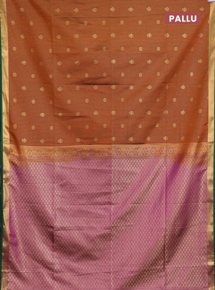 Semi soft silk saree rust shade and green with allover zari checks & buttas and rich zari woven border