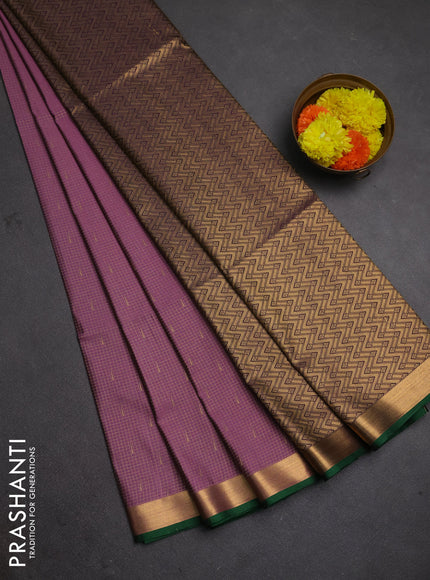 Semi soft silk saree mauve pink and green with allover small zari checks & buttas and zari woven border