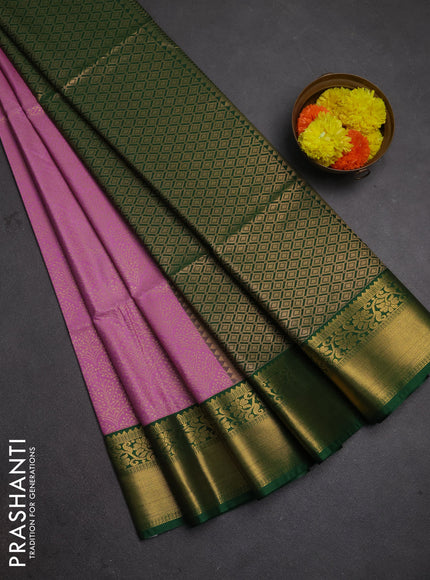 Semi soft silk saree mauve pink and green with allover zari woven brocade weaves and zari woven border