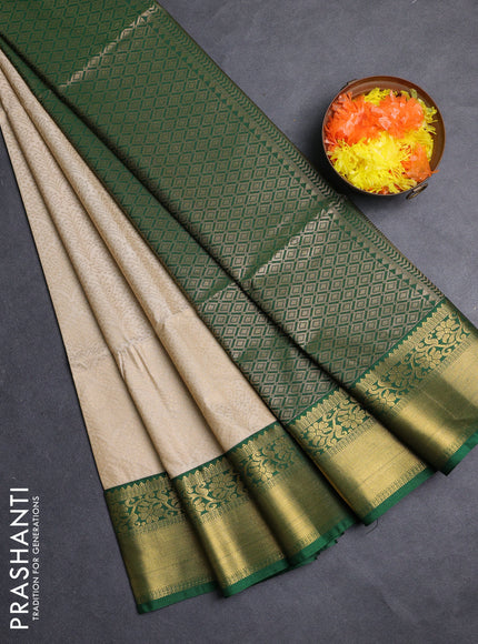 Semi soft silk saree beige and green with allover zari woven brocade weaves and zari woven border