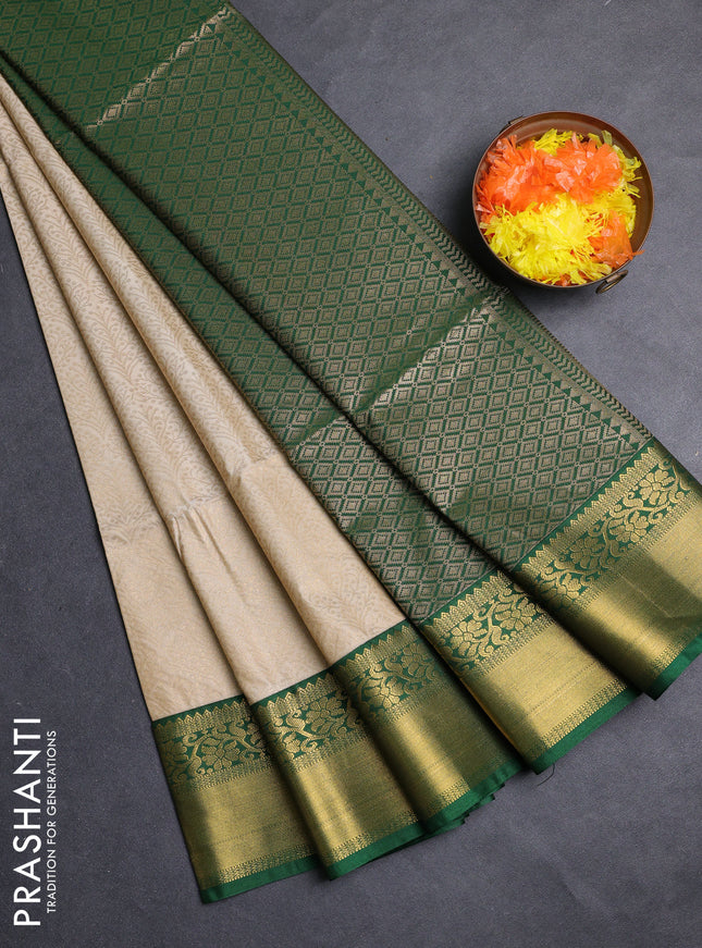 Semi soft silk saree beige and green with allover zari woven brocade weaves and zari woven border