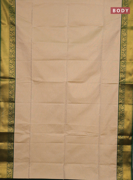 Semi soft silk saree beige and green with allover zari woven brocade weaves and zari woven border