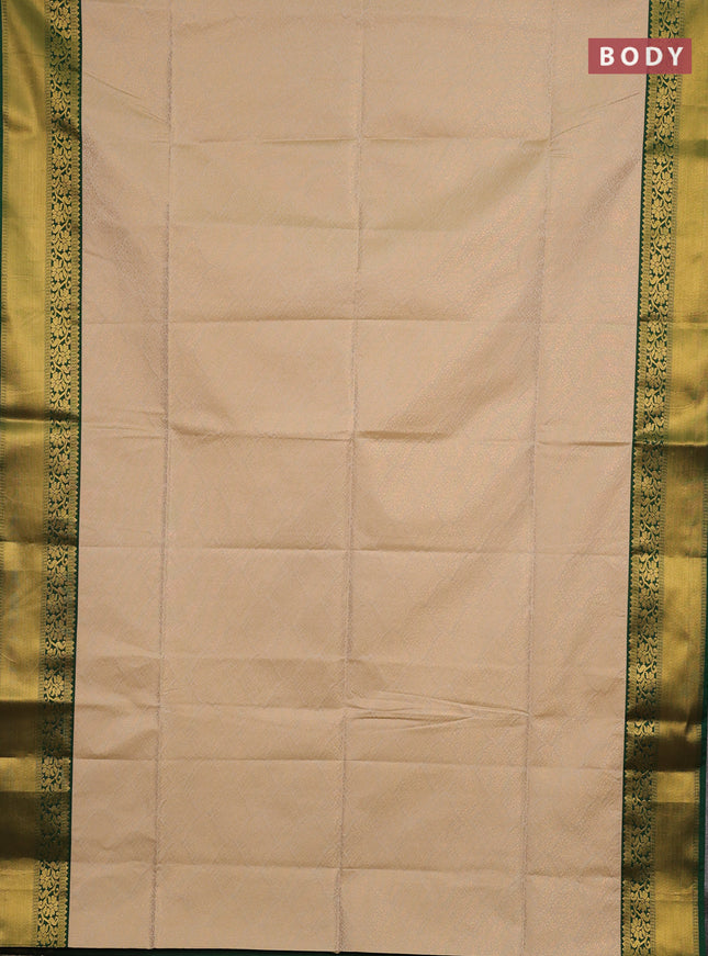 Semi soft silk saree beige and green with allover zari woven brocade weaves and zari woven border