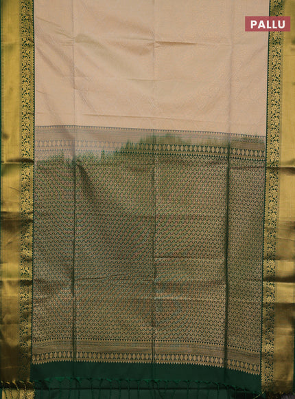 Semi soft silk saree beige and green with allover zari woven brocade weaves and zari woven border
