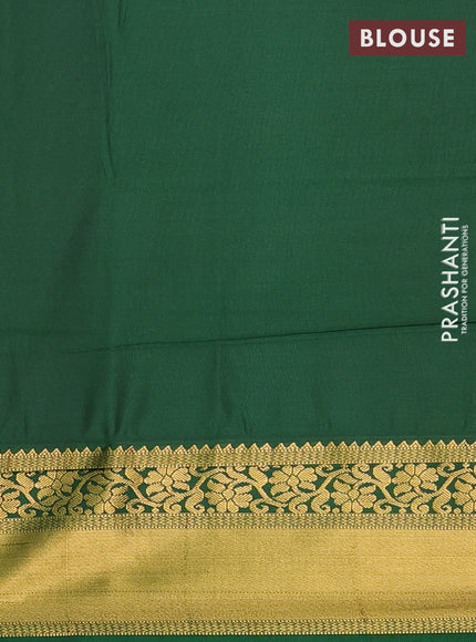 Semi soft silk saree beige and green with allover zari woven brocade weaves and zari woven border
