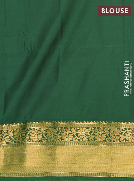 Semi soft silk saree magenta pink and green with allover zari woven brocade weaves and zari woven border