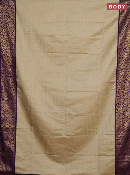 Semi soft silk saree beige and purple with allover zari brocade weaves and zari woven border