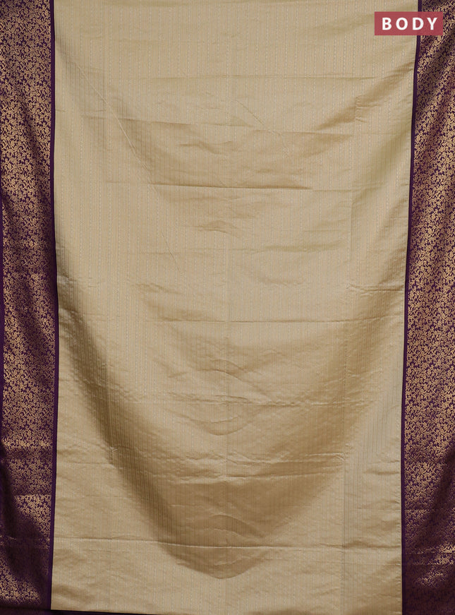 Semi soft silk saree beige and purple with allover zari brocade weaves and zari woven border