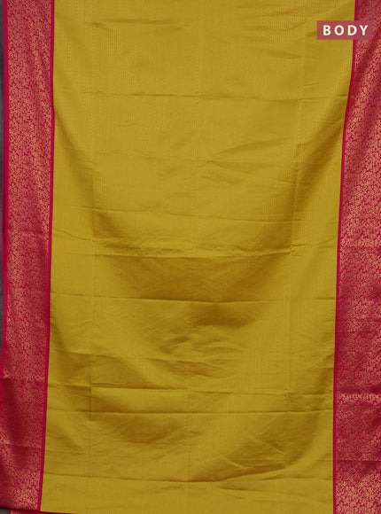 Semi soft silk saree yellow and pink with allover zari brocade weaves and zari woven border