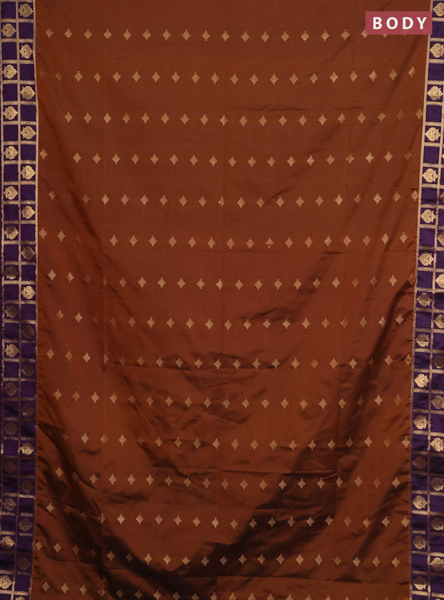 Semi soft silk saree dark mustard and purple with allover zari woven buttas and zari woven border