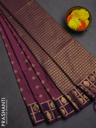 Semi soft silk saree mauve pink and purple with allover zari woven buttas and zari woven border