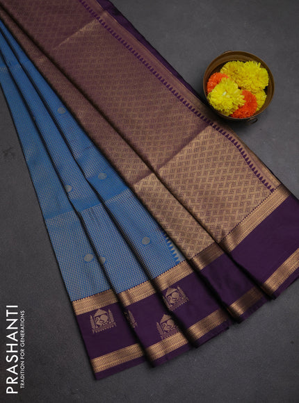 Semi soft silk saree peacock blue and purple with allover small zari checks & buttas and zari woven broder
